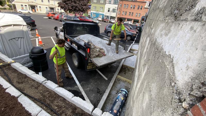 Camden Public Works get the capsule ready for burial. (Photo courtesy Alison McKellar)