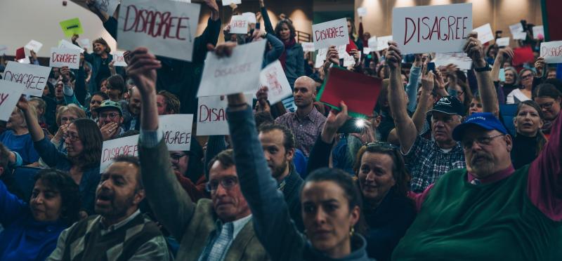 Jason Chaffetz Rally. Scene from The Ground Between Us. (Photo courtesy Strand Theatre)