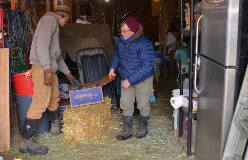 Mike and Cheryl Denz, in the barn at Terra Optima Farm.