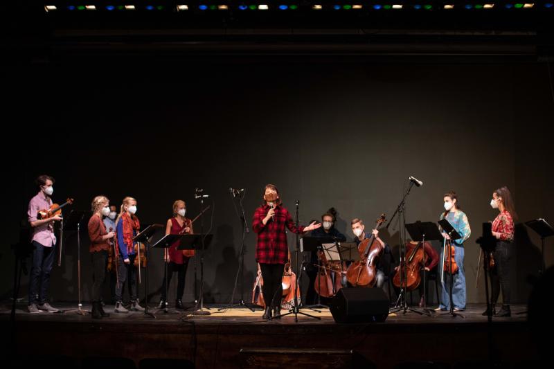Waldo Executive Director Kate Fletcher introduces Palaver Strings at the first live-streamed performance from the Theatre’s stage November 12, 2020. (Photo by Anna Finocchiaro)
Photo 2: Waldo volunteers, working in masks, recently replaced hundreds of lightbulbs in the Theatres famous 1930s acoustic panels in preparation for the installation of a new house- lighting dimmer system. Photo credit: Barbara Boardman