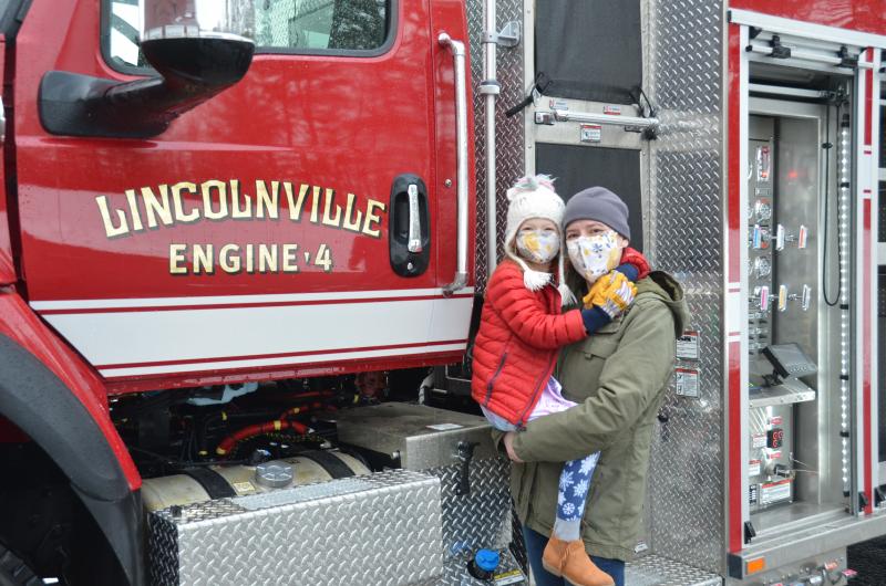 Danica Fullington and daughter Harper went to the Center fire station to see the new engine arrive in town Jan. 28.