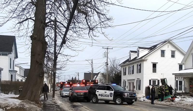 Main Street in Rockland is closed while firefighters and EMS tend to injured following a vehicle rollover into a house Feb. 18. (Photo by Sarah Thompson)