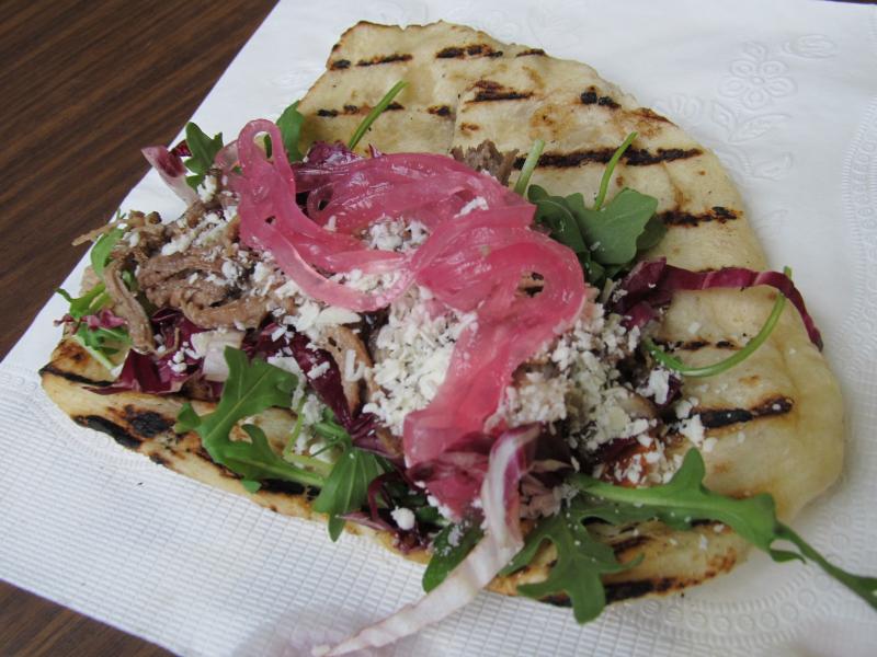 Hixon’s Calabrian pork grilled flatbread. Photo by Kay Stephens