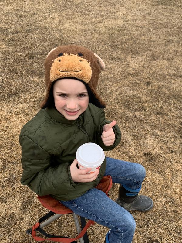 Carter Spicer enjoys a cup of hot cocoa. (Photo courtesy Thomaston Grammar School)