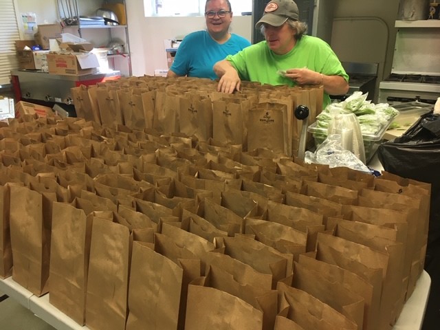 Three different schools work all morning and afternoon to provide bagged breakfasts and lunches. Photo courtesy HLC