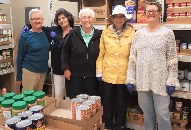 CACFP Thursday Volunteers (L to R): Sandy Shaw (normally a Tuesday volunteer), Lorraine Coakley, Faith Vautour, Penny Baum (dressed to weather the elements) and Sydney Hall. Missing from the picture are Pauline Johnstone and Annie Norris.