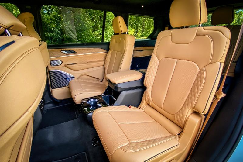 Captain’s chairs in the second row are standard in the Grand Cherokee L, but quilted leather upholstery is only for higher trim levels. Folding down both rows of rear seats creates sufficient space for a college dorm room’s worth of stuff.