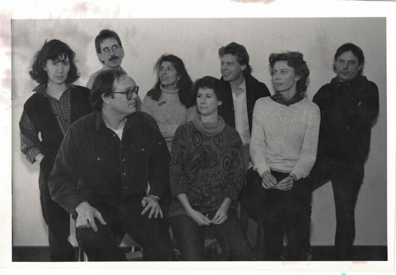 Some members of Artfellows, from left to right: Denise Remy, Stew Henderson, Richard Norton, Cathy Kaelin, Megan Pinette, Phil Kaelin, Janice Kasper, and Dennis Pinette posing for “School of Evocation” on New Years Day, 1985, in Belfast. (Photo courtesy Waterfall Arts)
