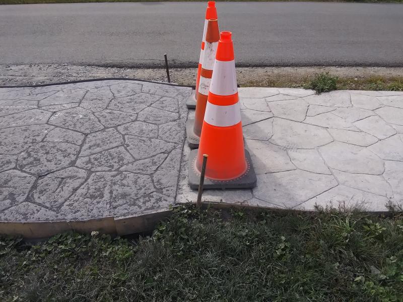 Not just a standard sidewalk, the quirky changes in pattern bring intrigue to a daily walk. (Photo by Sarah Thompson)