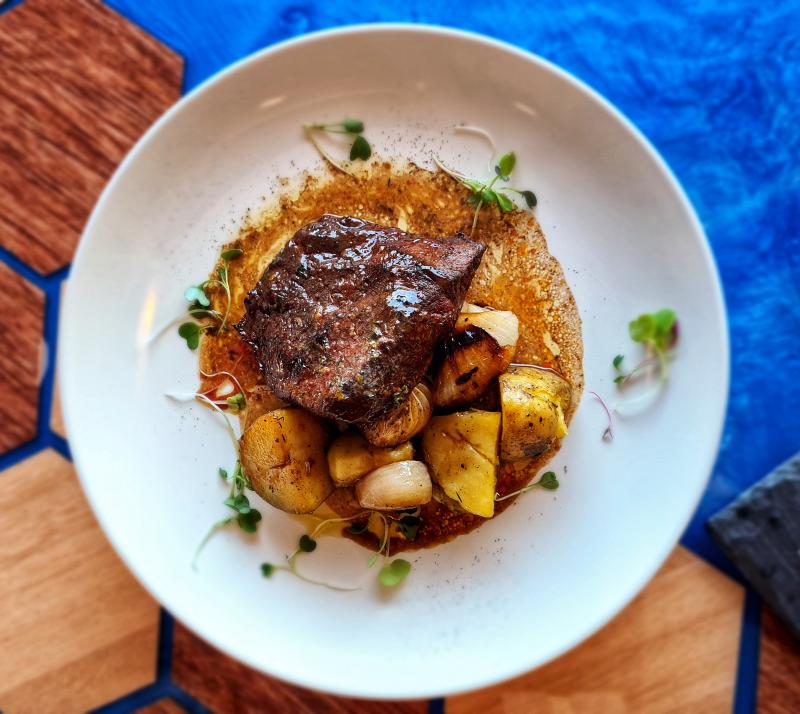 The flat iron steak dish. Photo courtesy Rio’s Spiked Café