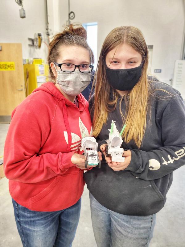 Machaeli Waltz (L), Lilly Dyer (R); Automotive Collision I. (Photo courtesy Mid-Coast School of Technology)