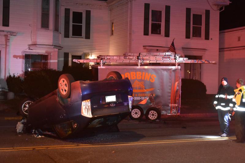 Park Street, in Rockland, was closed for about an hour due to a car on its roof in the southbound lane. (Photo by Sarah Thompson)