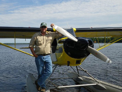 Scott Story with a floatplane. (Photo courtesy of Penobscot Air)