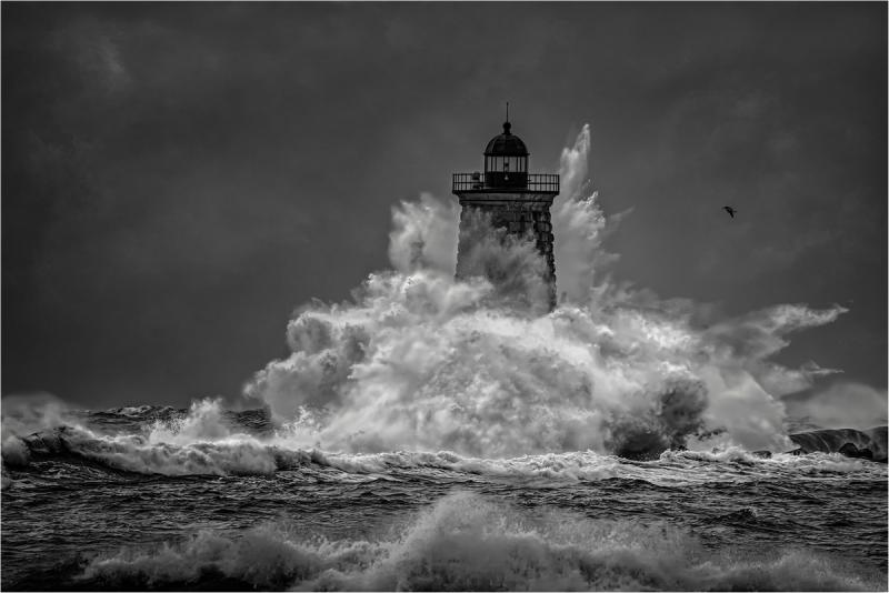 “Storming the LIght” by Richard Reynolds is among the B&W images in the 17th Maine Photography Show. Courtesy of MPS Richard Reynolds