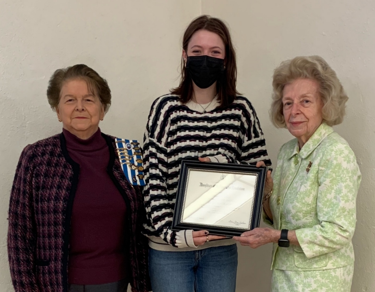 Regent Joanne Richards looks on as Magnolia Vinci, Watershed School, receives her certificate from Joyce Davies, vice-regent of Lady Knox Chapter. (Photo courtesy Lady Knox Chapter)