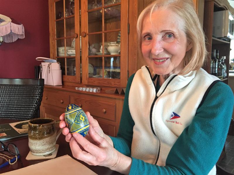 Alina Blakesley designed and painted this Ukrainian Easter egg in blue and yellow symbolizing the Ukrainian flag. LISA KRISTOFF/Boothbay Register