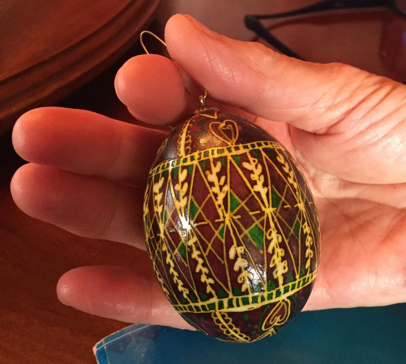 This egg with hearts, pussy willows (spring), and never ending lines of eternal life on a blood red canvas of hope and passion; dotted in green for hope, spring, breaking bondage; yellow for the stars, moon and sun, harvest, and the perpetuation of family. LISA KRISTOFF/Boothbay Register