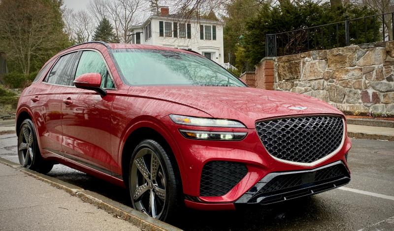 In rain-streaked Mauna Red, the 2022 GV70 Sport Prestige, with its subtle curves and LED lamps, the signature Genesis grille and 21-inch Cuisinart-blade wheels, cuts a striking figure. An overhead-view camera makes it easy to park along sharp-edged granite curbs.