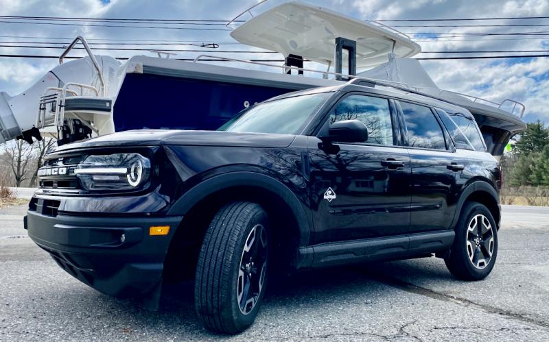 There’s nothing salty about the Ford Bronco Sport Outer Banks, nor can it tow a 15,000-lb. boat, but it looks sharp parked next to one. This color isn’t blue; in direct sunlight, it’s a metallic bronze that Ford calls Kodiak Brown.