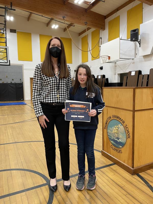Principal Ainslee Riley presents Alora Stewart with the Principal’s Award.
