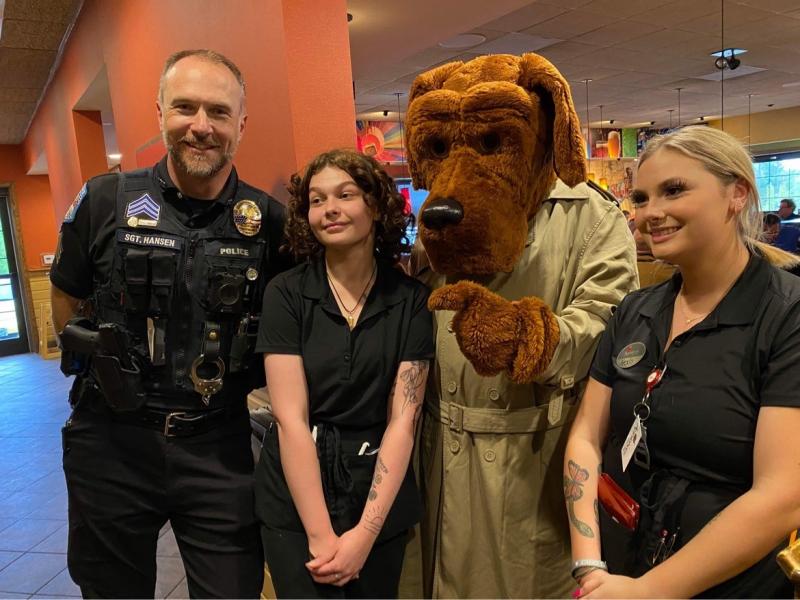 Thomaston Officer Hansen, McGruff the Crime Dog and Applebee's staff. (Photo courtesy Troy Peasley)