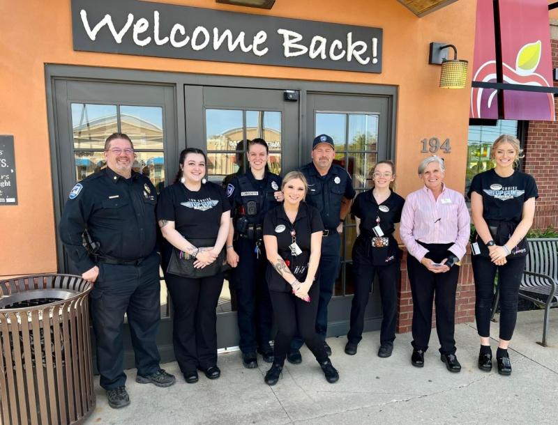 Rockland Chief Neal, Officer Pritchette, Officer Peasley and Applebee's management and staff. (Photo courtesy Troy Peasley)
