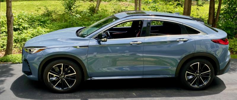 Even in this muted but rich Slate Gray, the QX55’s sleek silhouette stands out. Yes, the sloping roof cuts into rear headroom and cargo space, but front-seaters are in the lap of luxury.