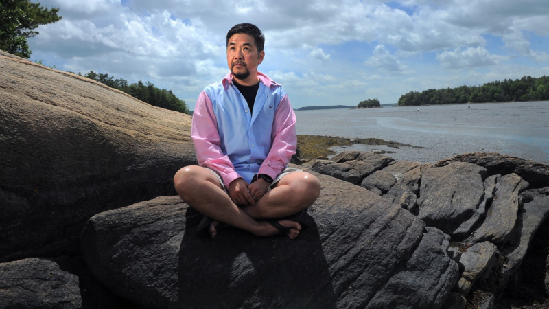 Near the mouth of the Little River in Freeport, Wilder Hart, a 55-year-old transgender male spoke about the stigma and journey transgender people face. A former online support group leader he said, “Trans individuals don’t feel safe being able to connect with health care services in general, so they just avoid it. They literally have to be dying before they go.” Photo by Fred J. Field.