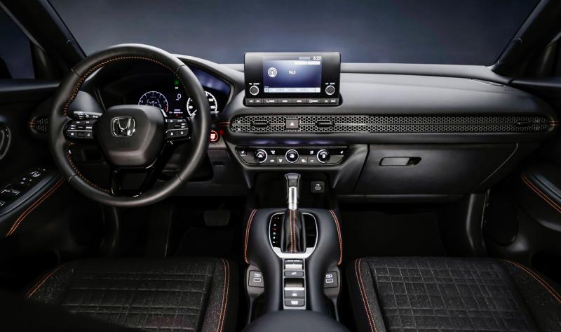 The HR-V cabin got a thorough overhaul too, and is now not just roomier and more attractive, but also far better equipped. The EX-L model gets 8-way-adjustable leather seats, dual-zone climate control, a sunroof, a phone charging pad, and a 9-inch touchscreen with wireless connectivity. (This, however, is the Sport trim—note the orange piping.)