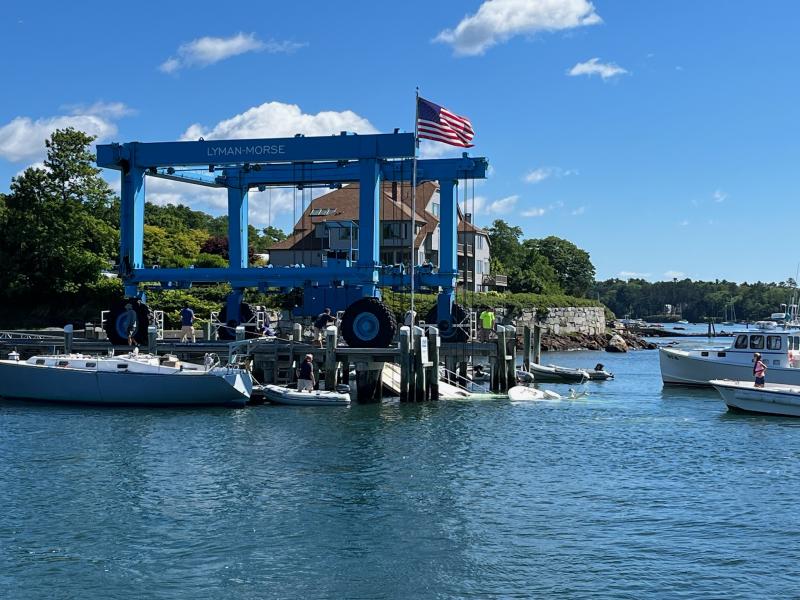 The Bandwagon, almost ready to be lifted from the water. (Photo courtesy Jesse Henry)