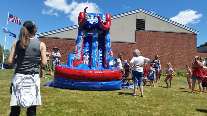 A huge red, white and blue water slide at the Thomaston Municipal Building delighted the younger crowd after the parade. (Photo by Sarah Shepherd)