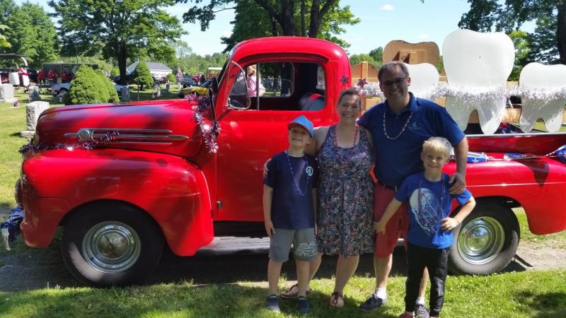 The Laliberte family joined the festivities at the Fourth of July parade. Notice the clue about Dr. Laliberte’s profession on the back of the truck? (Photo by Sarah Shepherd)