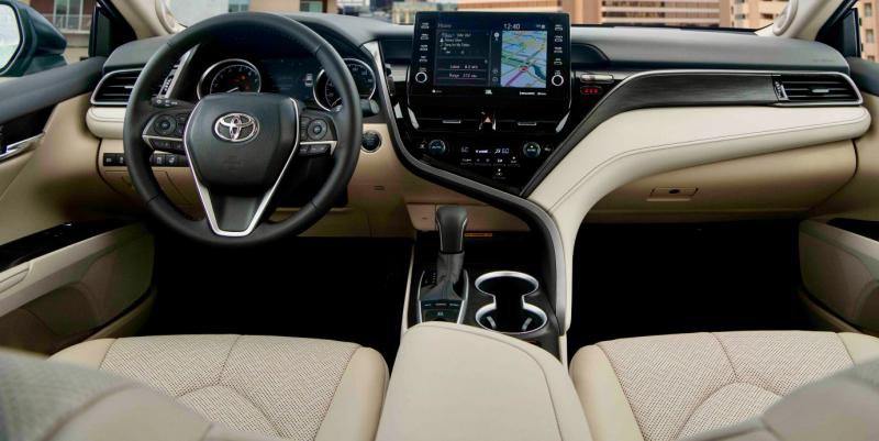 Two-tone upholstery helps cheer up any car’s interior, and the Camry’s switchgear and systems feel substantial and are easy to use.