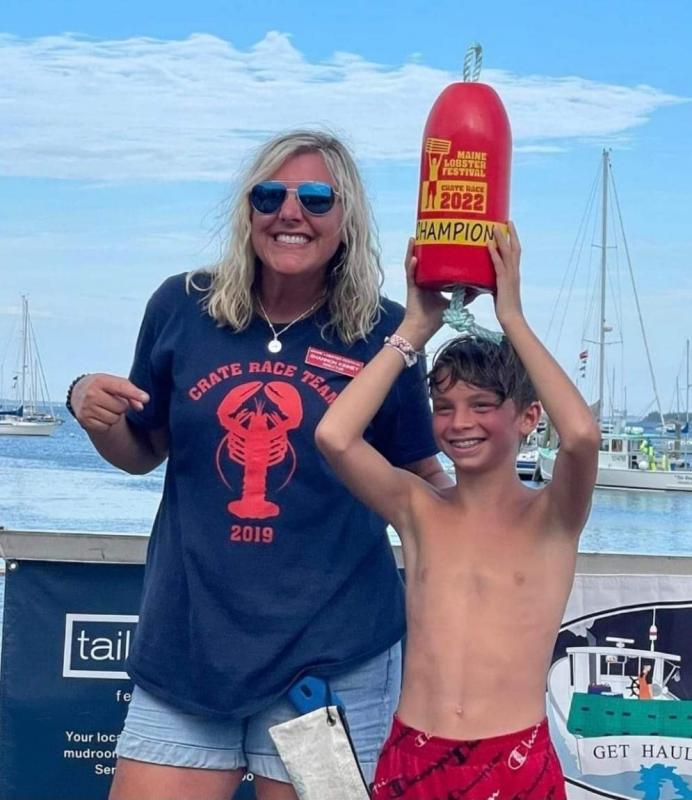 Maine Lobster Festival Director Shannon Kinney with International Great Crate Race Champion Aiden Genthner. Photo courtesy Maine Lobster Festival