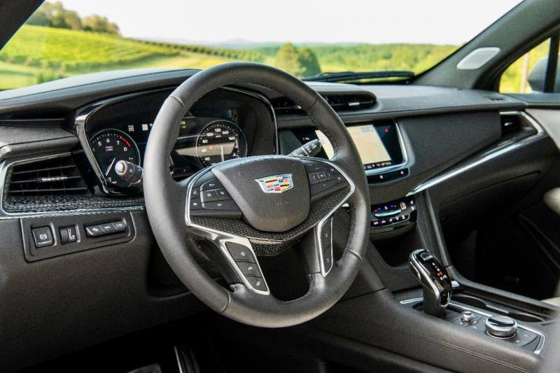 The cabin of the XT5 is spacious but underwhelming. Materials, fit and finish are not “Cadillac”-level; and a peculiar luggage rack in the cargo bay appears to have been cobbled together out of folding camp chairs.