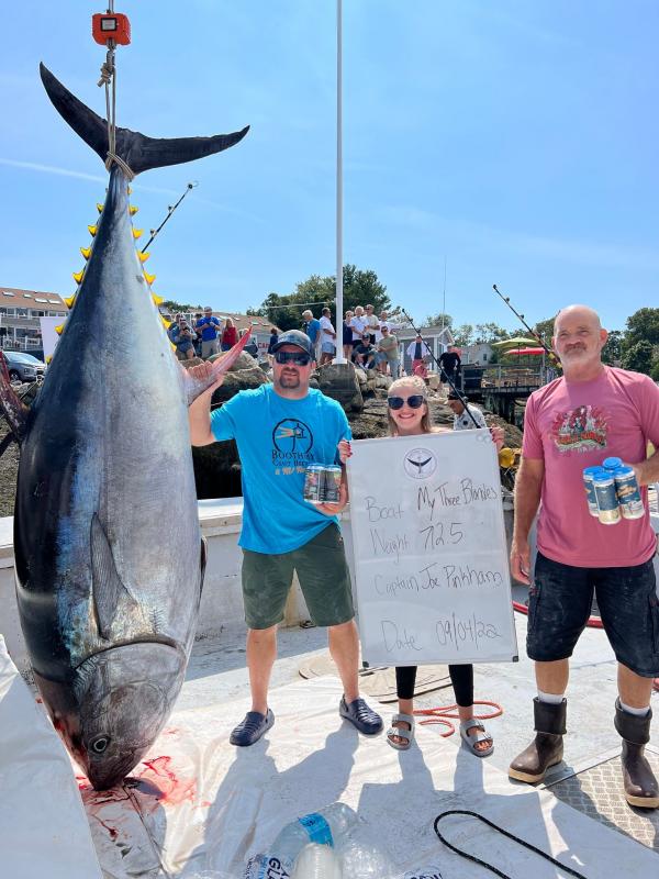 Capt. Joe Pinkham of My Three Blondes and his 712-pound tuna on the first day of the tournament. Facebook photo
