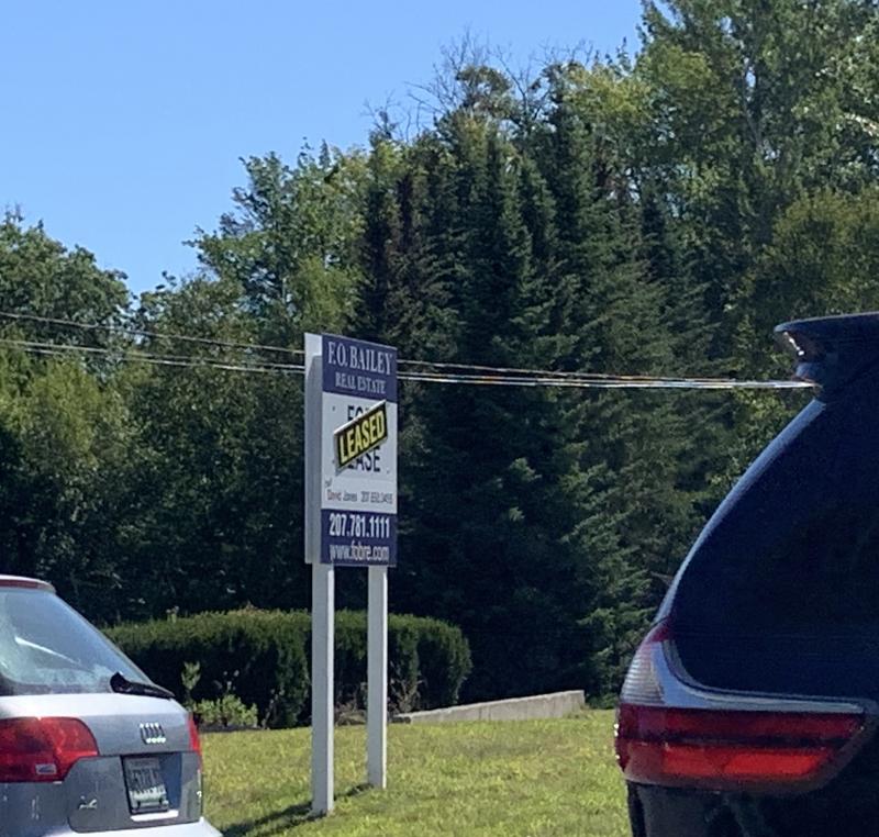 Amid growing traffic Sept. 2 at the start of Labor Day Weekend, cars pass the “leased” sign at the former Big Al’s Super Values on Route 1, Wiscasset. SUSAN JOHNS/Wiscasset Newspaper