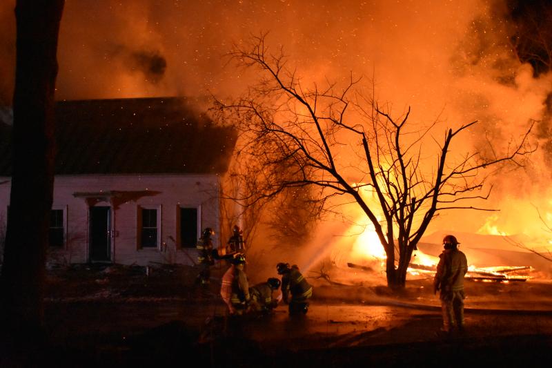 Sarah Thompson earned first place for Spot News Photo of a devastating house fire on Hope Street in Hope, January 2022.