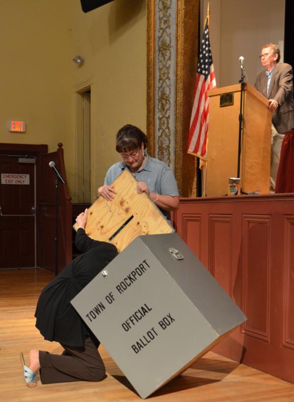 Rockport Town Clerk Linda Greenlaw scours the 2017 Annual Town Meeting ballot box, helped by Shay Ames. (Photo by Lynda Clancy)