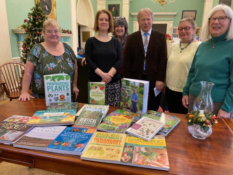 Pictured left to right: Sharon Davenport, cochair of the BGC books
committee; Tiffany Howard, Left Bank Books co-owner; Stephanie Holman, Belfast Free Library children’s librarian; Steve Norman, Belfast Free Library director; Barbara Gage, president of the Belfast Garden Club; and Lee Graham, co-chair of the BGC books
committee. (Photo courtesy Belfast Garden Club)