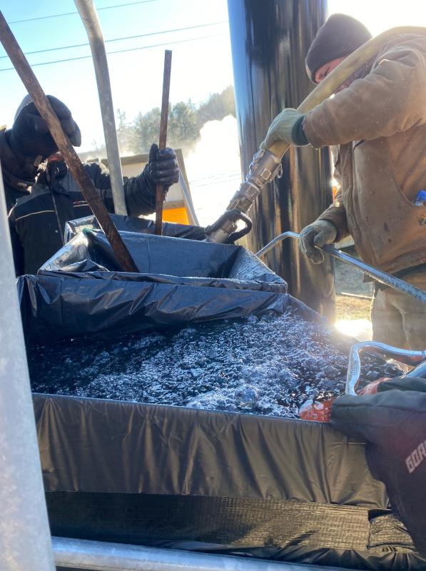 Engineer Ross Stevens and electrician Tom Bates assisting Snow Bowl crew with dynamic testing the triple chairlift. (Photo courtesy Camden Snow Bowl)