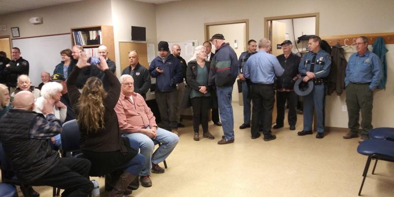 The crowd talks amongst themselves as they wait for the ceremony to begin. (photo by Erica Thoms)
