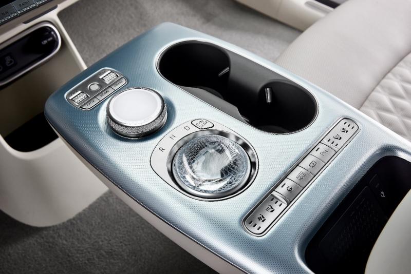 The forward knob is the controller for the computer, which also has a touchscreen. The large crystalline ball lights up and rotates to become the gear-selector knob, with deeply indented finger notches. (it’s almost impossible to confuse the two knobs, as in earlier Genesis vehicles.) These and the other switches are wonderfully clear and easy to use.