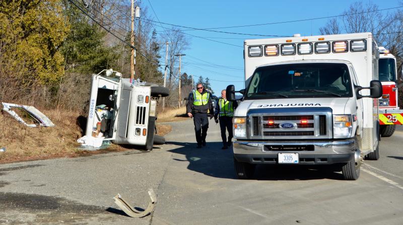 Rockport Police Officer Travis Ford and Camden-Rockport Police Chief Randy Gagne assess the two-vehicle crash on Route 1 Jan. 11. (Photo by Lynda Clancy)