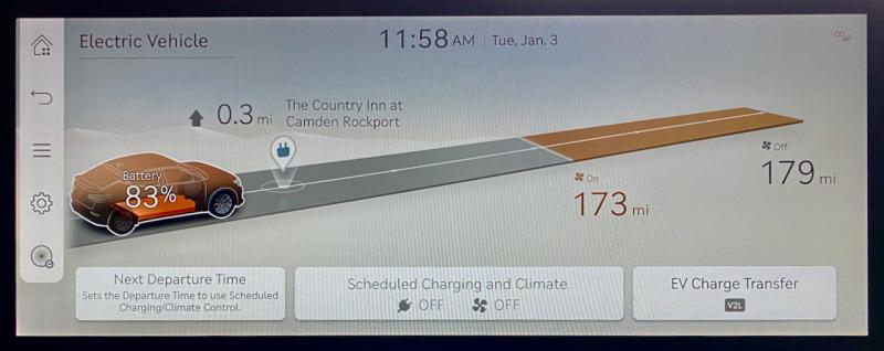 The “EV” panel on the 12.3-inch center screen. It shows remaining charge as a percentage and as miles of range. The two mileage figures are with climate control on and, for maximum range, with climate control off. Also shown is the nearest public charging point.