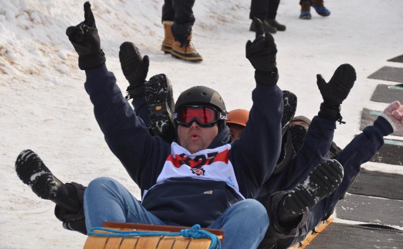 The Town of Rockport beat its sole competitor this year, the Town of Camden. The tradition of the two-town sled competition began in 2016 when two toboggans filled with four select board members from each town pitted their times against one another. That was Rockport’s 125th birthday celebration, after it had split from the Town of Camden in 1891. In 2016, Camden won the toboggan competition. This year, the Rockport toboggan was filled with Town Manager Jon Duke, Harbormaster Abbie Leonard, Finance Director Megan Brackett and Public Works crew member Kevin Grierson. They made good time down the chute, surprising everyone with the possibility of even going into the finals. (Photo by Lynda Clancy)