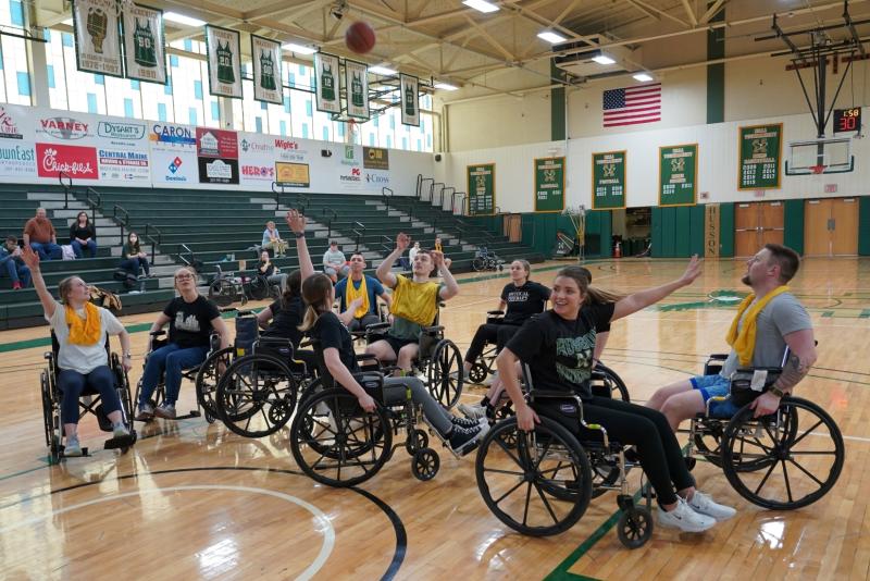 Open to the entire campus, the annual wheelchair basketball competition provides students with a greater appreciation of the challenges confronting the physically disabled as they have fun. A story about last year's wheelchair basketball competition can be found at Husson.edu/news/2022/03/wheelchair-basketball-2022 (Photo courtesy Husson University)
