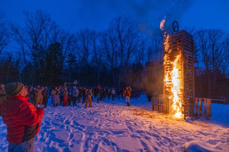 Protesters of plans by Exiro Minerals to conduct mining explorations in Union and Warren burned a 20-foot-tall tower, “Shaft the Mine”, that symbolized the specter of metal mining in the Georges River Watershed. (Photo courtesy Sean Carnell)