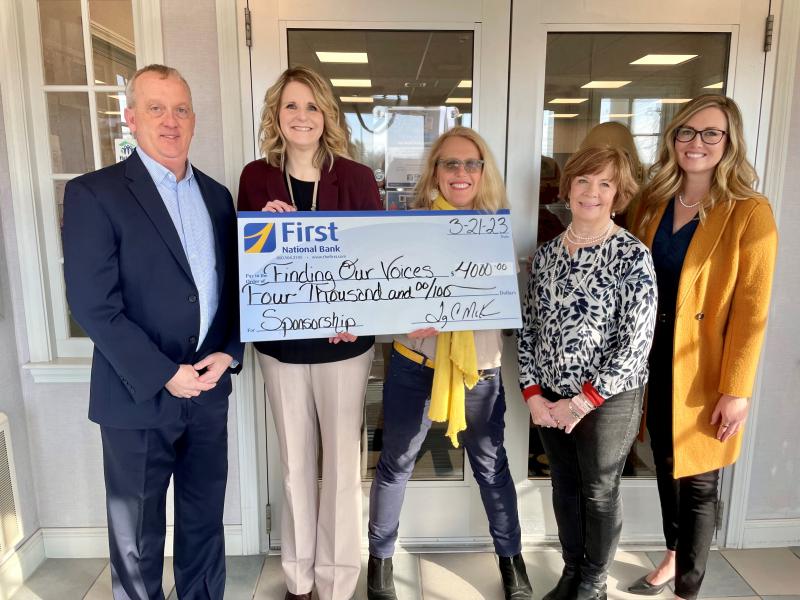 From left to right: First National Bank President and CEO Tony McKim; VP, Business Development Officer, Michelle Curtis; Patrisha McLean of Finding Our Voices; EVP, Chief Administrative Officer, Susan A. Norton and AVP, Corporate Engagement and Development Officer, Kristen McAlpine. (Photo by Samantha Glaude)