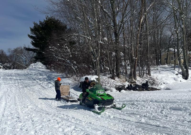 Getting onto the ice the easy way. (Photo by Ed O’Brien) Snowmobile